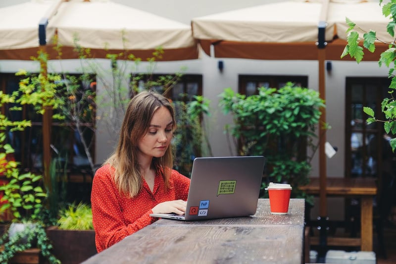 Self-employed founder working on laptop — Swiss Einzelunternehmen registration