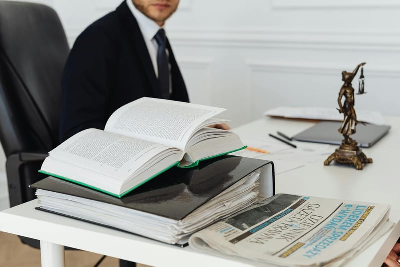 Law book on office desk — Swiss commercial legal services