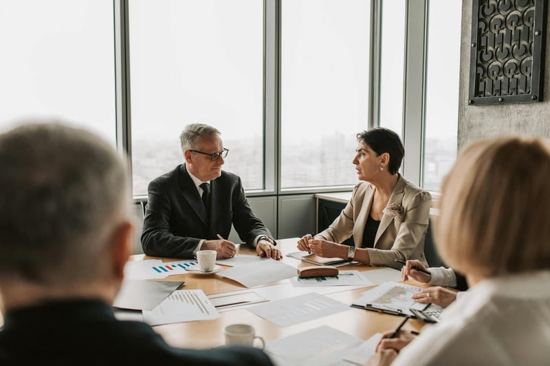 Corporate boardroom strategy meeting — Swiss company restructuring