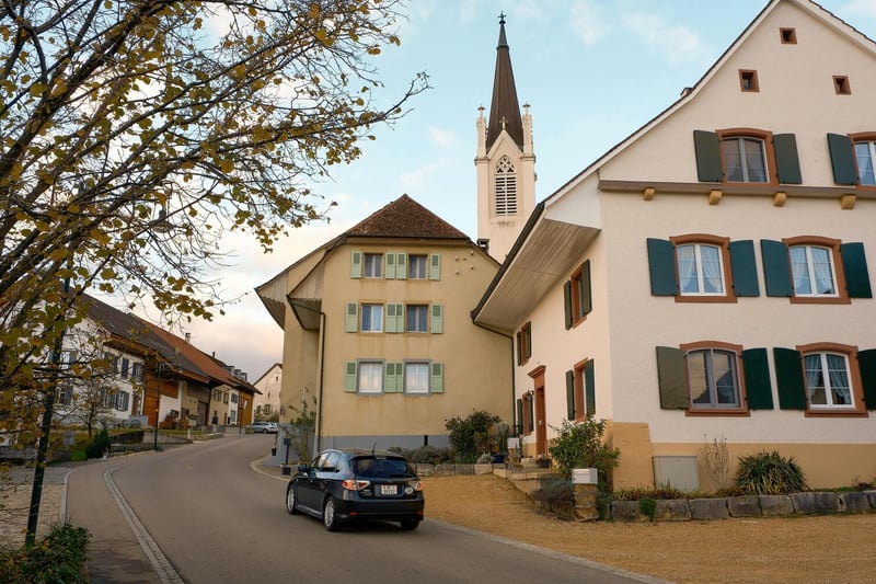 Lake Geneva lakefront with Vaud canton backdrop — Vaud's lump-sum taxation and proximity to international schools make it a preferred personal-residence canton for UHNW family office principals